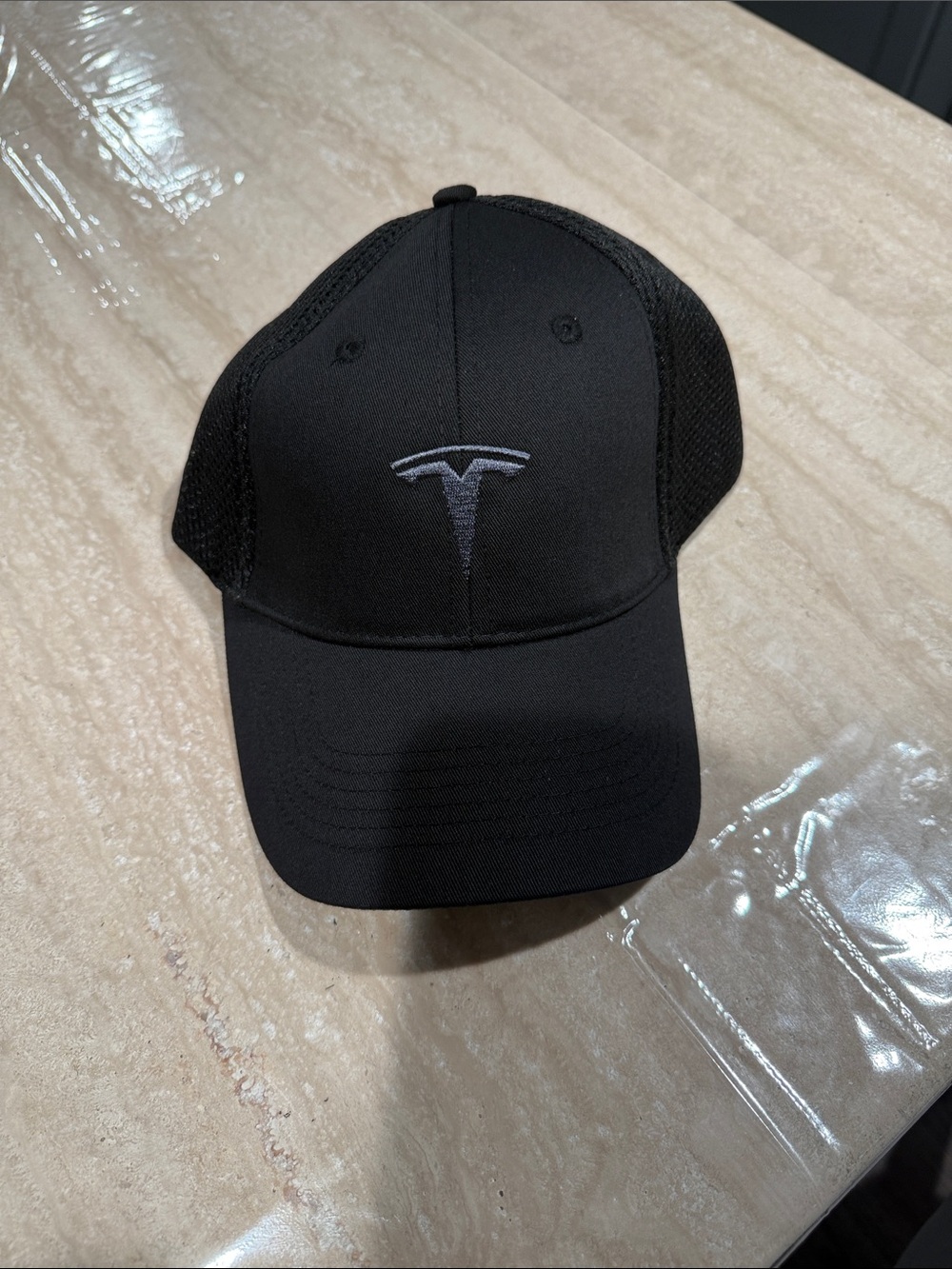 Tesla Black Trucker Cap with Gray Embroidered Logo